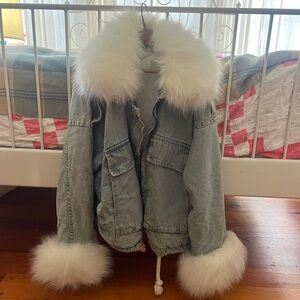Denim jacket with faux fur details